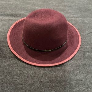 Woman’s maroon hat